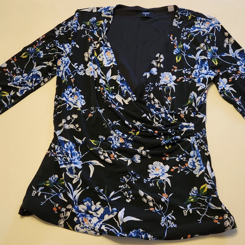 Tahari Cross over top. Has a great slinky feel to it. Great condition.